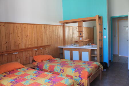 Chambre avec lits multiples